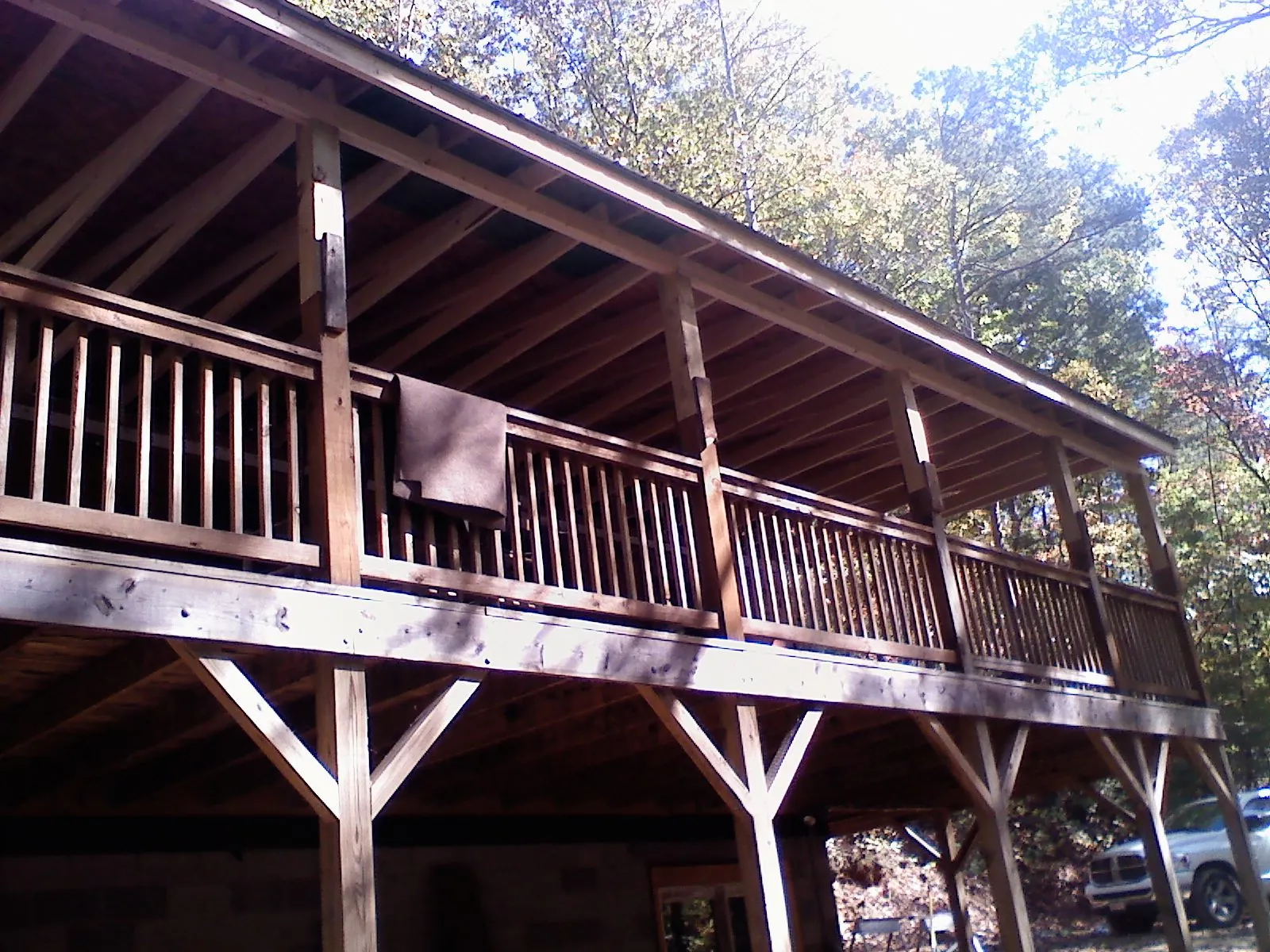 Timber framing under a new elevated porch and deck — Roof Leak Repair in Cohocton by Roofing Brothers